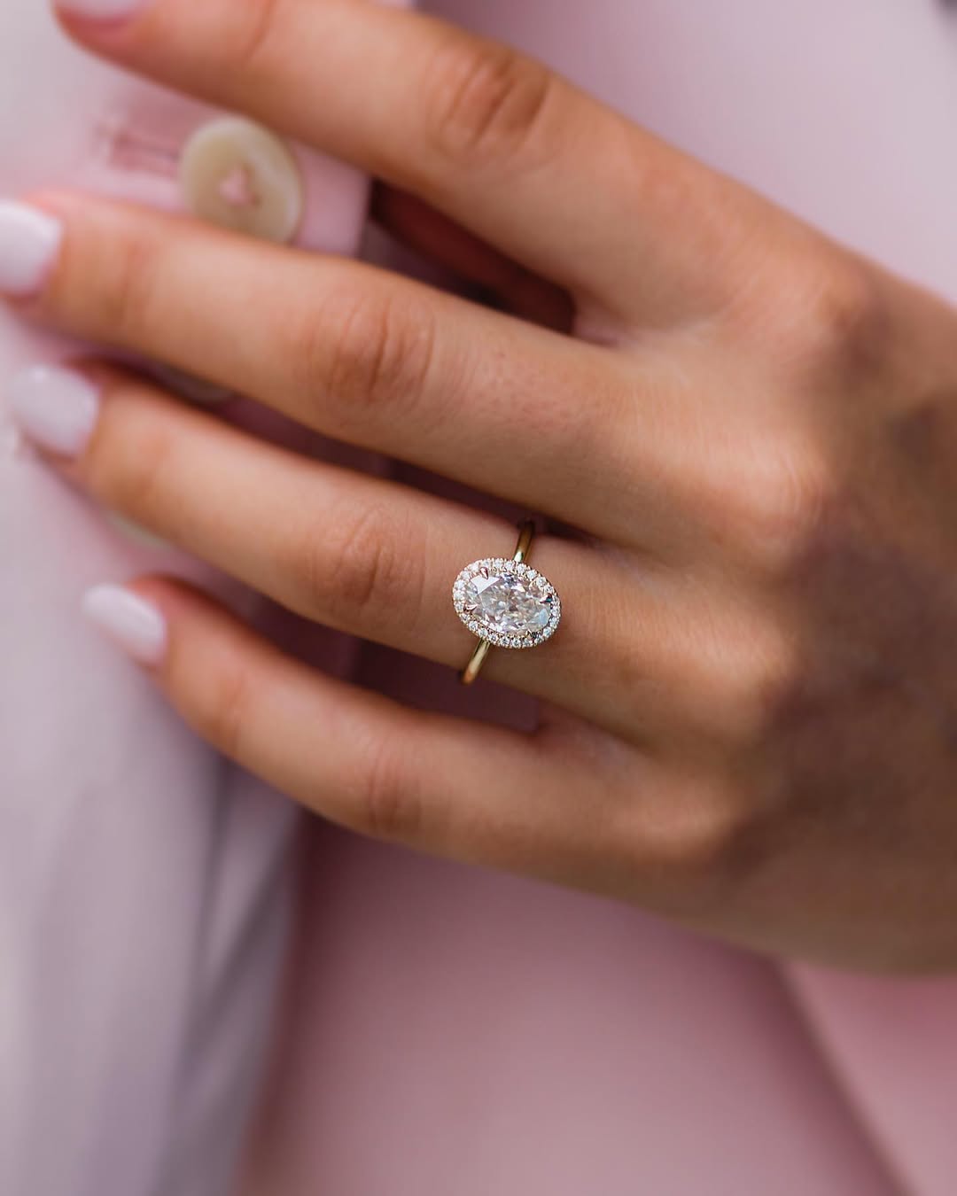 A dainty 1mm halo surrounding a 1.85 carat skinny oval with a solitaire band ✨