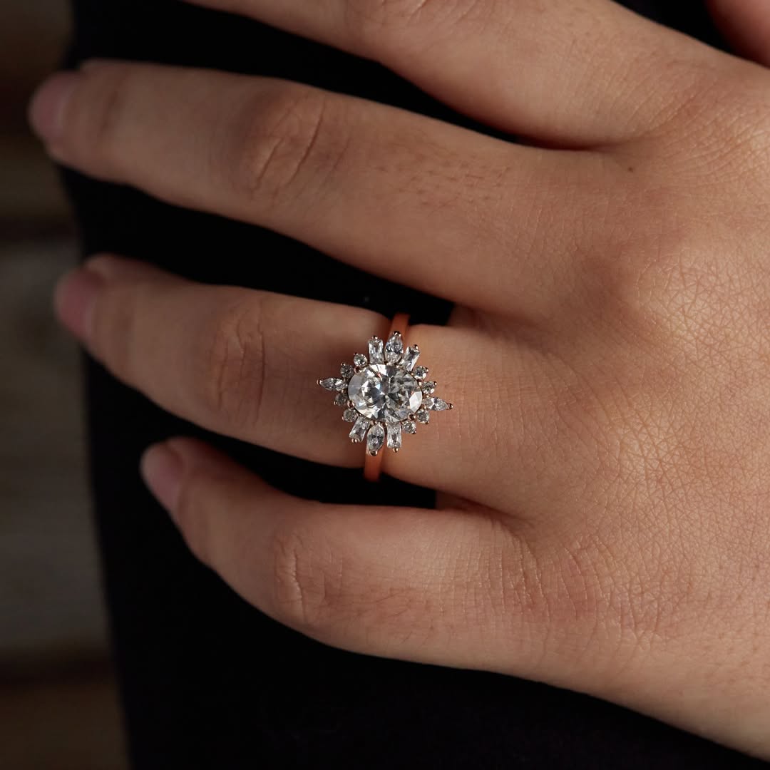 Crystal clear oval moissanite buds stand on four Marquise, four radiant, eight round moissanite, (1)