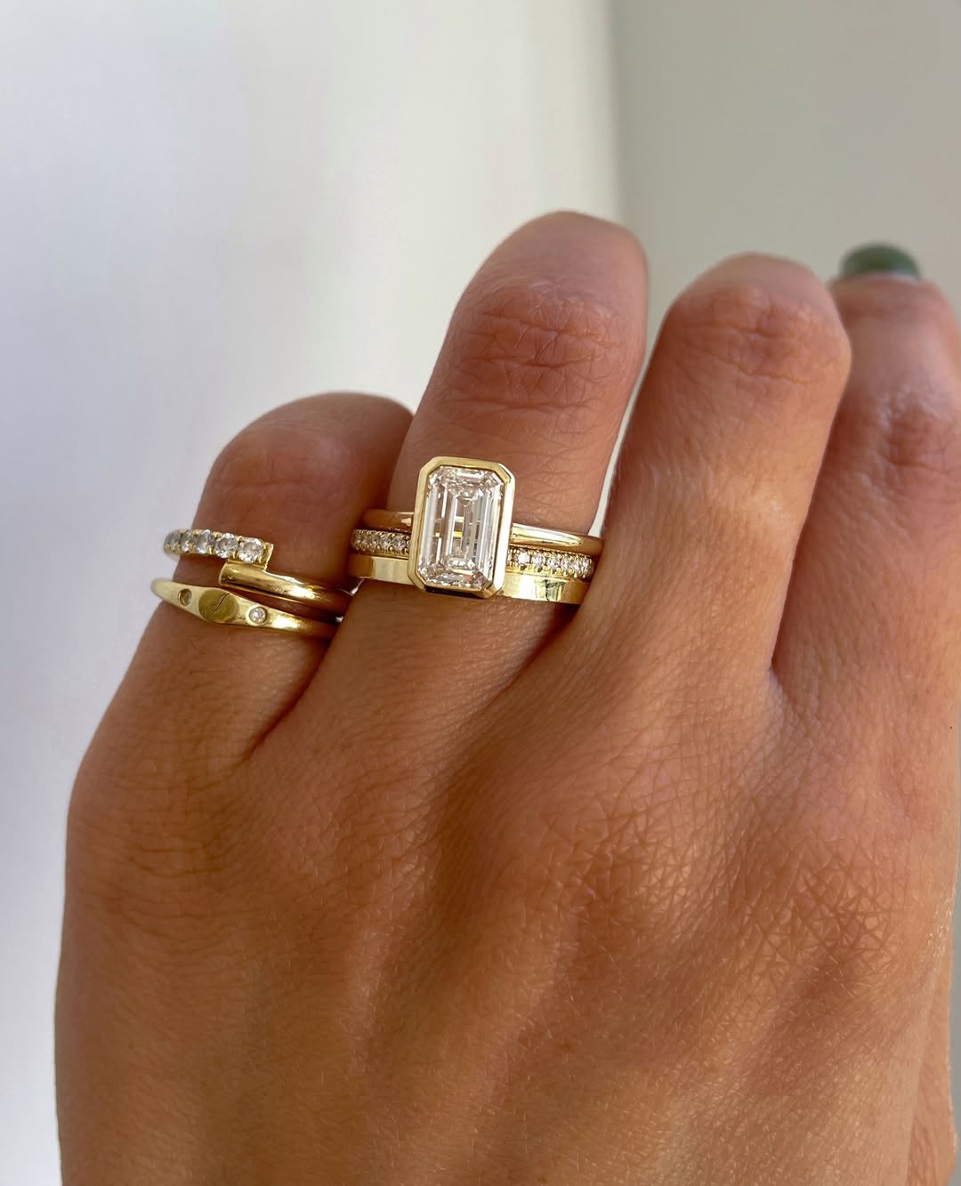 Ring stack inspiration for the gorgeous JOURNEE. An Emerald Bezel Solitaire paired with Cl (1)