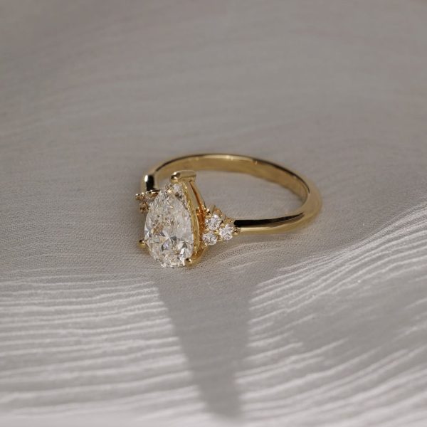 Timeless and effortlessly elegant Meet Brooke a stunning pear cut solitaire, accented with thr