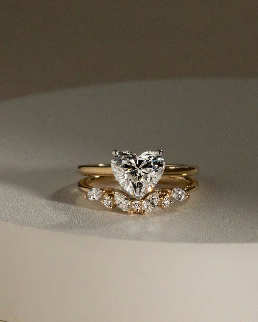 Where two hearts meet his heart and her perfect arc. The heart diamond solitaire crowned with
