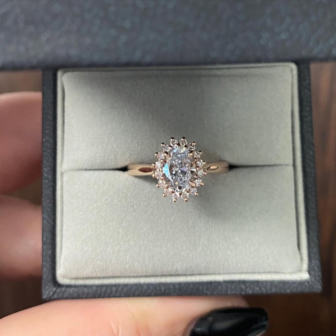 ✨The Elva! A 0.91ct oval diamond set within halo with added antique flare.Feel free to send us a (1)